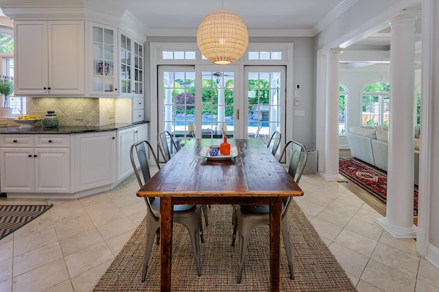 134 Nod Rd, Ridgefield, CT 06877 - dining space featuring decorative columns, ornamental molding, and light tile patterned flooring