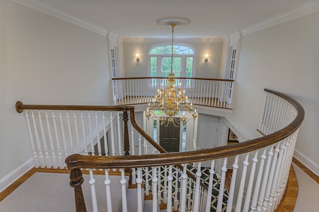 134 Nod Rd, Ridgefield, CT 06877 - stairway with ornamental molding, baseboards, a chandelier, and wood finished floors
