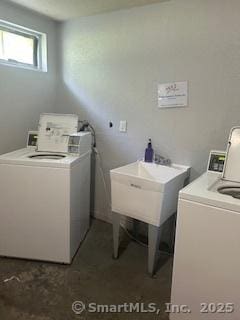 laundry area with separate washer and dryer