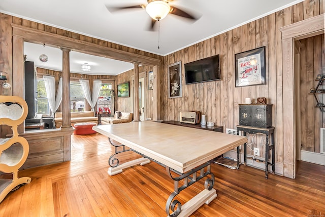 441 Savin Ave, West Haven, CT 06516 - rec room featuring decorative columns, ceiling fan, wood-type flooring, ornamental molding, and wood walls