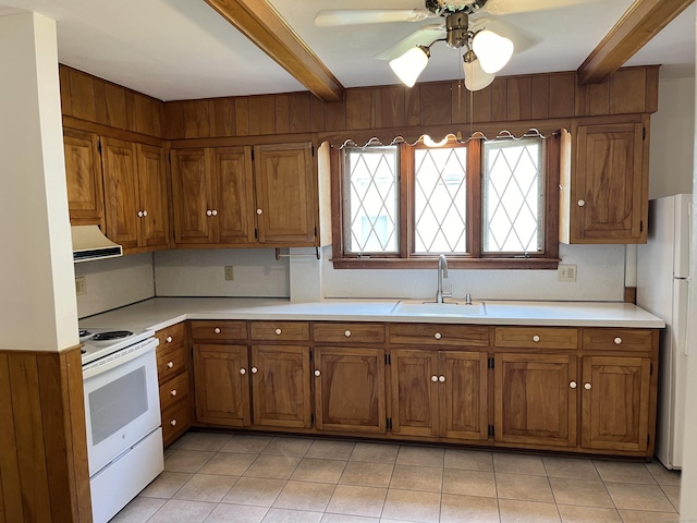 47 Beacon St, Hamden, CT 06514 - kitchen with white appliances, ventilation hood, beam ceiling, brown cabinets, and a sink