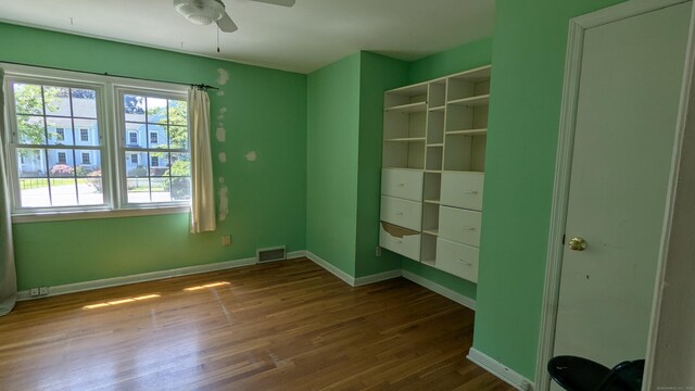 11 Twin Brooks Ln, Fairfield, CT 06824 - unfurnished bedroom with dark wood finished floors and baseboards
