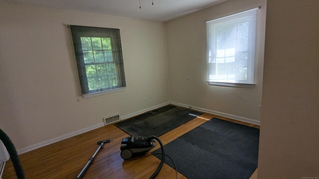 11 Twin Brooks Ln, Fairfield, CT 06824 - exercise area with wood finished floors and baseboards