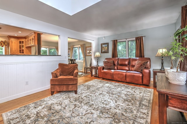76 Crestwood Rd, Bethany, CT 06524 - living area featuring wood finished floors, healthy amount of natural light, and baseboards