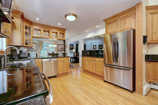 76 Crestwood Rd, Bethany, CT 06524 - kitchen with appliances with stainless steel finishes, light wood-type flooring, a peninsula, a sink, and recessed lighting