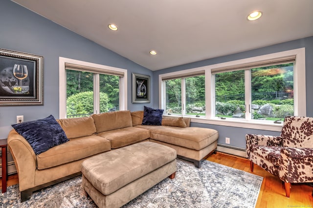 76 Crestwood Rd, Bethany, CT 06524 - living area with baseboard heating, lofted ceiling, recessed lighting, and wood finished floors