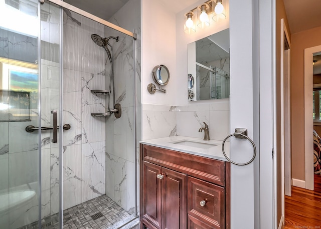 76 Crestwood Rd, Bethany, CT 06524 - bathroom featuring vanity, a marble finish shower, and wood finished floors