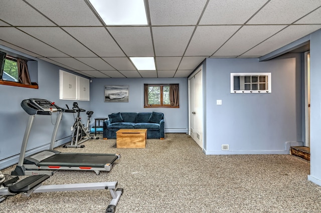 76 Crestwood Rd, Bethany, CT 06524 - exercise room with a paneled ceiling, a baseboard heating unit, carpet flooring, and baseboards
