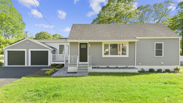 48 Blakeslee Ave, North Haven, CT 06473 - view of front of property with a garage, a front lawn, and asphalt driveway