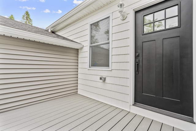 48 Blakeslee Ave, North Haven, CT 06473 - doorway to property with a shingled roof