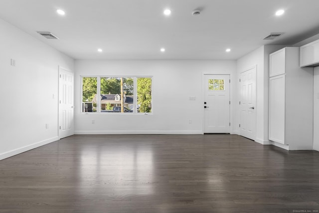 48 Blakeslee Ave, North Haven, CT 06473 - unfurnished room featuring plenty of natural light, recessed lighting, dark wood-type flooring, and baseboards