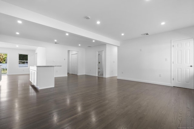 48 Blakeslee Ave, North Haven, CT 06473 - unfurnished living room with recessed lighting, dark wood-style flooring, and baseboards