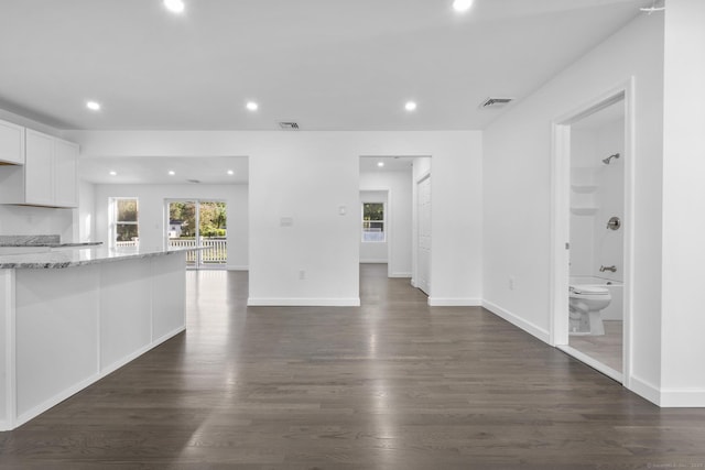 48 Blakeslee Ave, North Haven, CT 06473 - kitchen with plenty of natural light, recessed lighting, white cabinets, and dark wood-type flooring