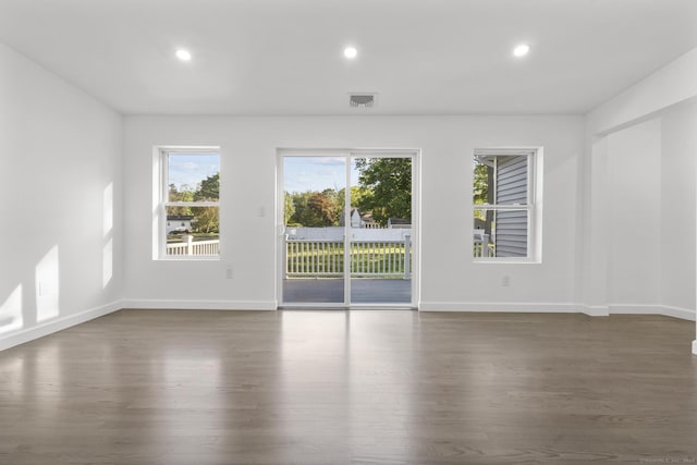 48 Blakeslee Ave, North Haven, CT 06473 - empty room with dark wood-style floors, plenty of natural light, recessed lighting, and baseboards