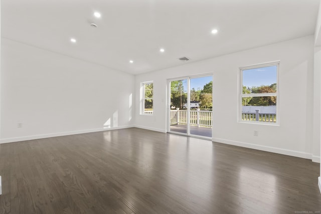 48 Blakeslee Ave, North Haven, CT 06473 - spare room featuring baseboards, dark wood-style flooring, and recessed lighting