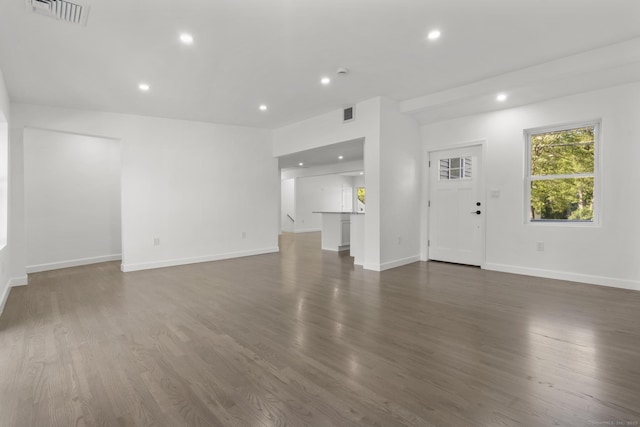 48 Blakeslee Ave, North Haven, CT 06473 - unfurnished living room featuring recessed lighting, dark wood-type flooring, and baseboards