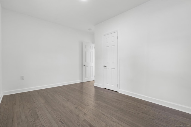48 Blakeslee Ave, North Haven, CT 06473 - empty room featuring dark wood-style flooring and baseboards