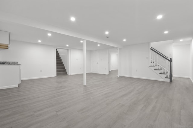48 Blakeslee Ave, North Haven, CT 06473 - finished below grade area featuring stairway, recessed lighting, baseboards, and light wood-type flooring