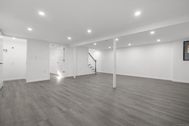 48 Blakeslee Ave, North Haven, CT 06473 - finished below grade area featuring recessed lighting, stairs, dark wood-style flooring, and baseboards