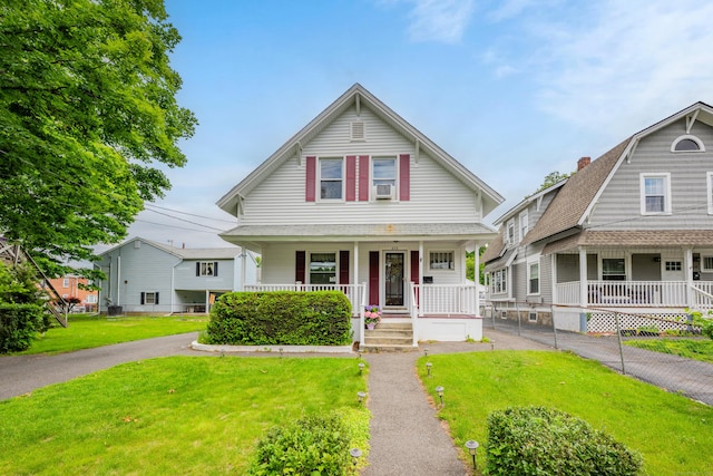 273 Piedmont St, Waterbury, CT 06706 - view of front of home with covered porch and a front yard