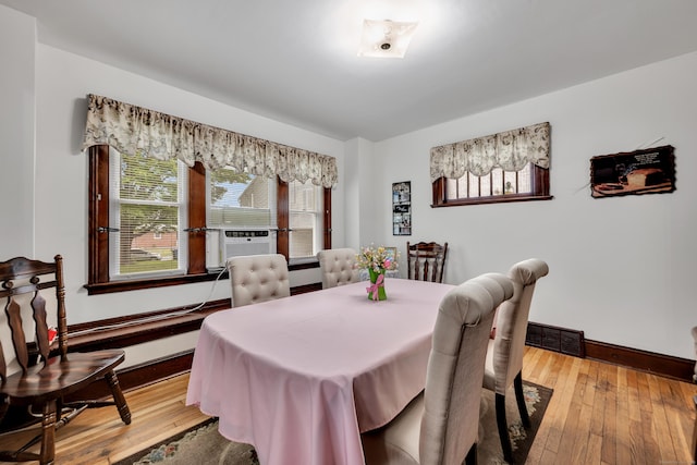 273 Piedmont St, Waterbury, CT 06706 - dining space with plenty of natural light, light wood-type flooring, baseboards, and cooling unit