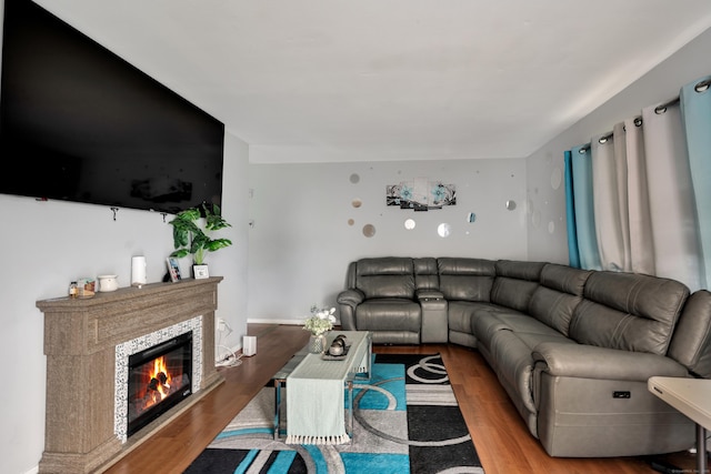 68 Round Tree Dr Unit 9, Naugatuck, CT 06770 - living area featuring wood finished floors and a tiled fireplace