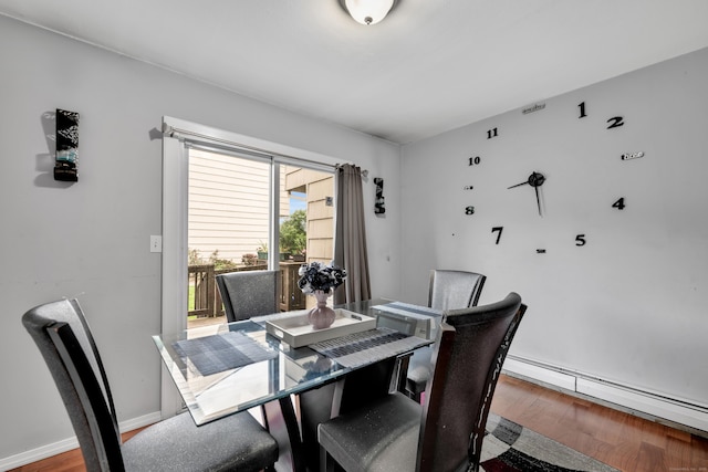 68 Round Tree Dr Unit 9, Naugatuck, CT 06770 - dining room with baseboard heating, wood finished floors, and baseboards