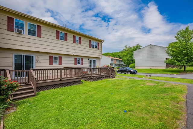 68 Round Tree Dr Unit 9, Naugatuck, CT 06770 - back of house featuring a wooden deck, a yard, and cooling unit