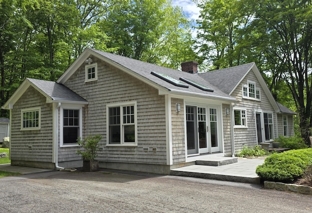 24 River Rd, Deep River, CT 06417 - rear view of property with a shingled roof, a chimney, and french doors