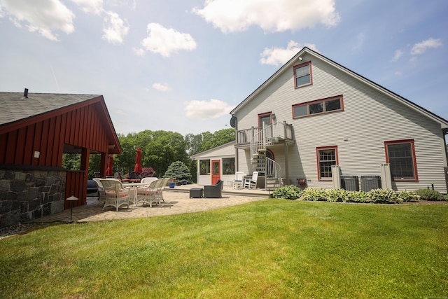 289 Woodchuck Ln, Harwinton, CT 06791 - back of house featuring a patio, a balcony, a yard, board and batten siding, and stairway
