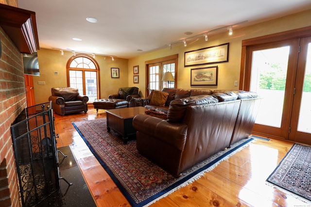 289 Woodchuck Ln, Harwinton, CT 06791 - living area with track lighting, hardwood / wood-style flooring, plenty of natural light, and recessed lighting
