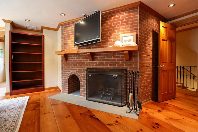 289 Woodchuck Ln, Harwinton, CT 06791 - unfurnished living room featuring crown molding, light wood-style floors, a fireplace, and recessed lighting