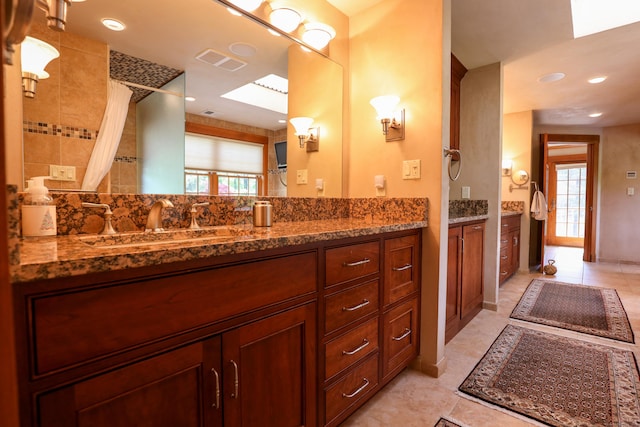 289 Woodchuck Ln, Harwinton, CT 06791 - full bathroom featuring vanity, tile patterned flooring, a skylight, a shower with curtain, and recessed lighting