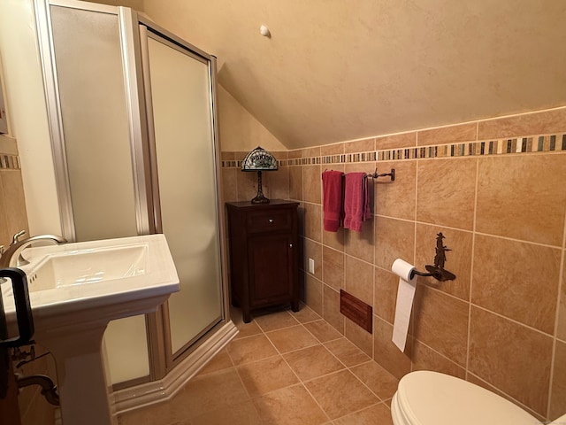 289 Woodchuck Ln, Harwinton, CT 06791 - bathroom featuring lofted ceiling, a shower stall, tile patterned floors, and tile walls