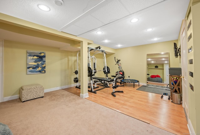 67 Old Farms Rd, Glastonbury, CT 06073 - workout room with recessed lighting, carpet, and wood finished floors