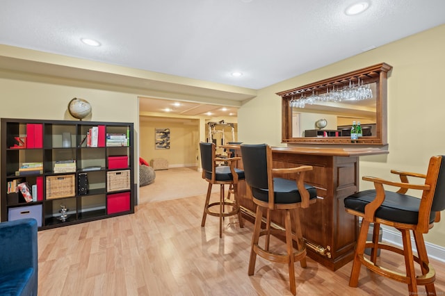 67 Old Farms Rd, Glastonbury, CT 06073 - indoor dry bar featuring wood finished floors and recessed lighting