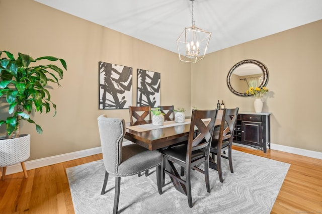 67 Old Farms Rd, Glastonbury, CT 06073 - dining area featuring a chandelier and wood finished floors