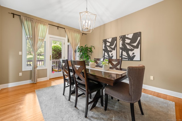 67 Old Farms Rd, Glastonbury, CT 06073 - dining area featuring a chandelier and light wood-style floors