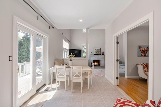 67 Old Farms Rd, Glastonbury, CT 06073 - dining space featuring a brick fireplace and recessed lighting