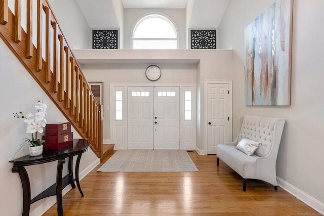 67 Old Farms Rd, Glastonbury, CT 06073 - entrance foyer featuring stairs, wood finished floors, and a towering ceiling