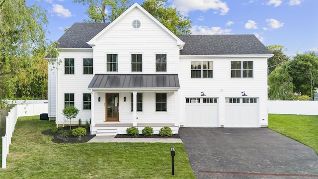 45 Robin Cir, Fairfield, CT 06824 - modern farmhouse style home with a porch, a garage, asphalt driveway, a standing seam roof, and metal roof