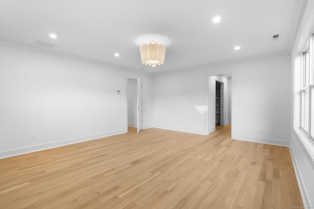 45 Robin Cir, Fairfield, CT 06824 - empty room featuring crown molding, light wood-style flooring, baseboards, and recessed lighting