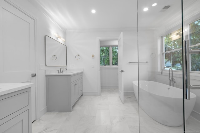 45 Robin Cir, Fairfield, CT 06824 - full bathroom with ornamental molding, two vanities, marble finish flooring, a freestanding tub, and recessed lighting