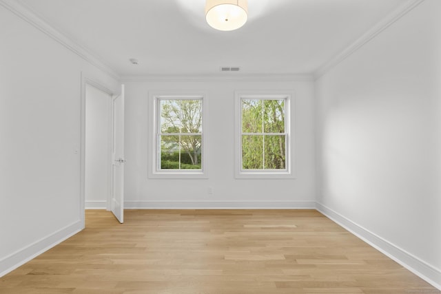 45 Robin Cir, Fairfield, CT 06824 - spare room with ornamental molding, light wood-style flooring, and baseboards