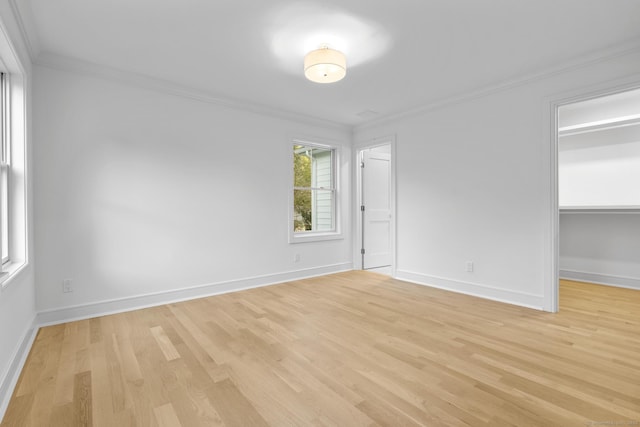 45 Robin Cir, Fairfield, CT 06824 - unfurnished room featuring crown molding, light wood-type flooring, and baseboards