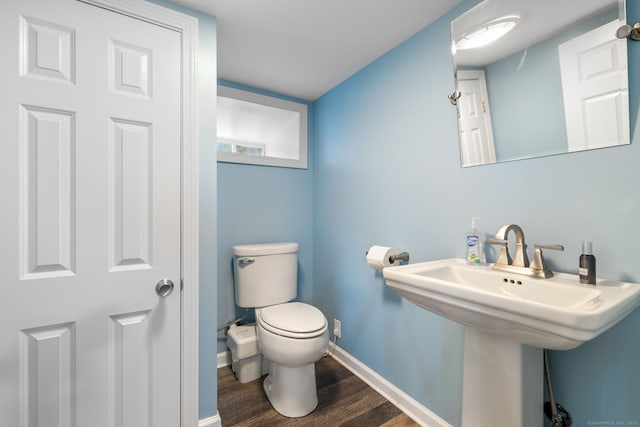 200 Perch Rock Trl, Winchester, CT 06098 - half bathroom featuring toilet, wood finished floors, and baseboards