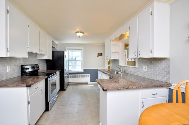 6 Lennox Ave, Windsor, CT 06095 - kitchen with appliances with stainless steel finishes, radiator, white cabinets, tasteful backsplash, and ornamental molding