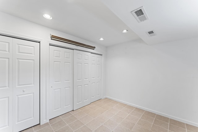 56 Pembroke Rd Apt 11, Danbury, CT 06811 - unfurnished bedroom with baseboards and recessed lighting