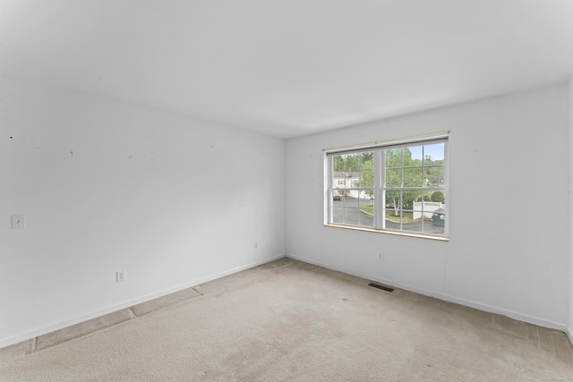 56 Pembroke Rd Apt 11, Danbury, CT 06811 - carpeted empty room featuring baseboards