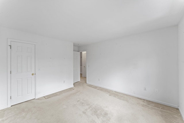 56 Pembroke Rd Apt 11, Danbury, CT 06811 - empty room with carpet floors and baseboards